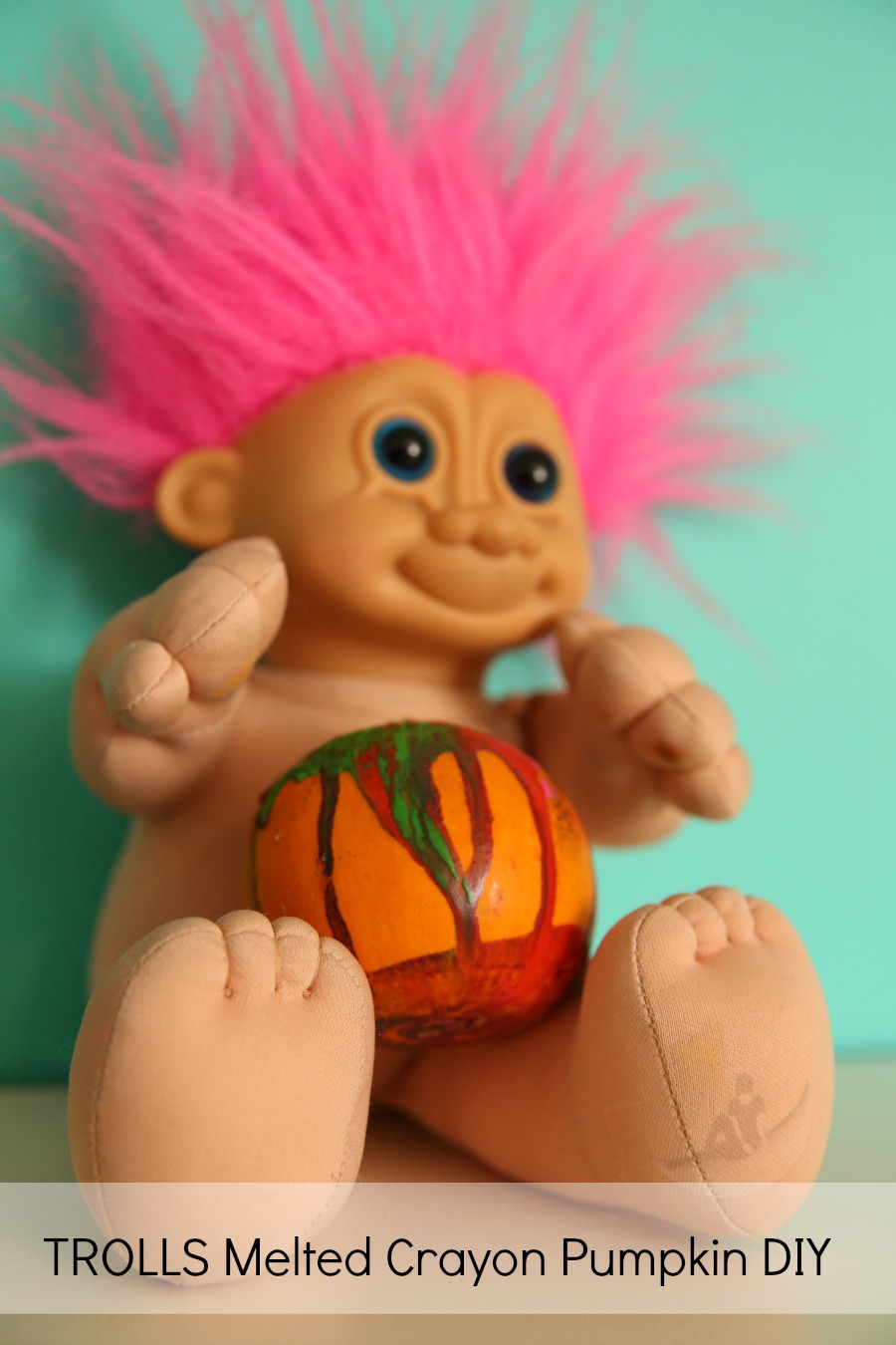 Our "vintage" Troll with TROLLS melted crayon pumpkin DIY
